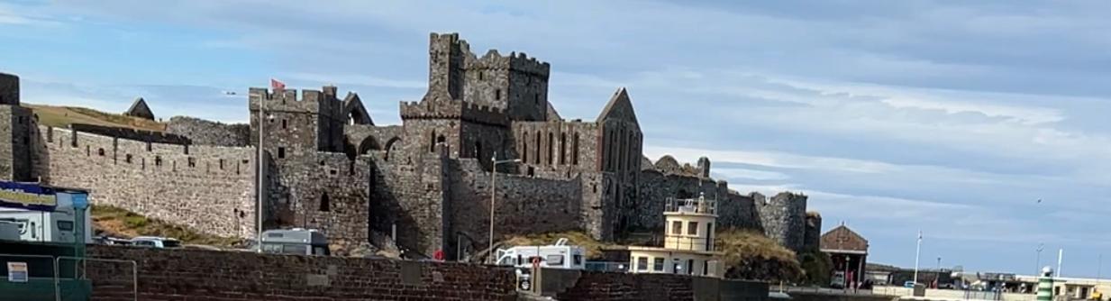 Peel Castle on St Patrick's Isle seen across Peel harbour